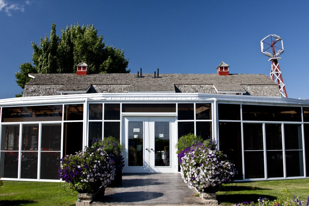 A sunroom was added to an old barn to help enjoy the summer weather